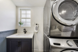 Laundry and sink in garage living space