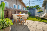 Side yard with patio and shed