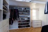 Master Bedroom walk in closet with built-in storage