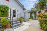 Back of house, deck and backyard