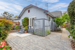 Back of house, deck, side yard, and backyard