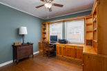 Bedroom 1, office with built in cabinetry