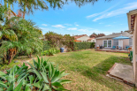 large backyard, view of back of house