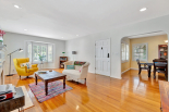 Living room, view towards front door and dining room