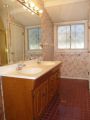 Front bathroom, dual sinks, shower & tub