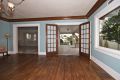 Large dining room with French Doors to wrap-around porch